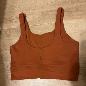 Nike Yoga luxe Infinalon dri-fit crop top/sports bra in rust